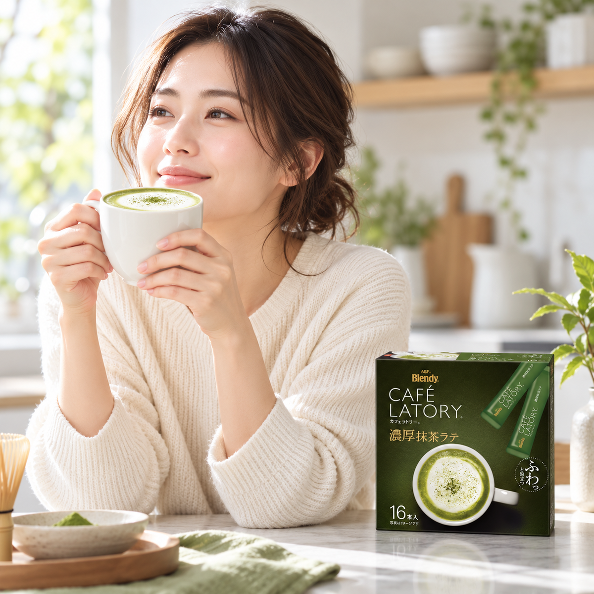 Japanese woman enjoying a cup of AGF rich matcha latte