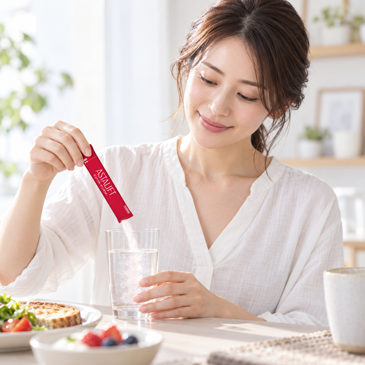Japanese model mixing one sachet into a beverage; illustrative