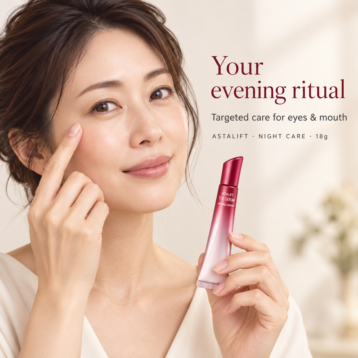 Japanese model demonstrating fingertip night care with ASTALIFT Wrinkle Repair Night 18g tube