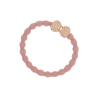 by Eloise hair accessory, centered on white background