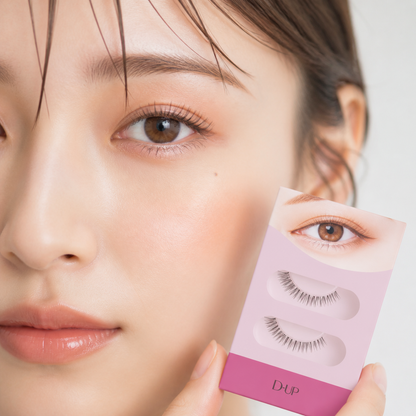 Model wearing D-UP Airy Curl LASH