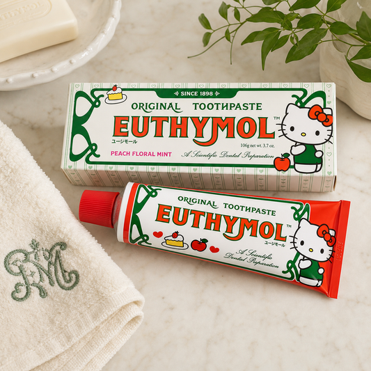 EUTHYMOL Hello Kitty toothpaste and box on a premium vanity