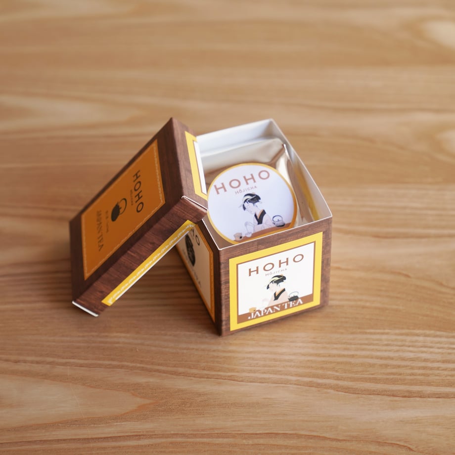 Opened HOHO HOJICHA tea bag box with individually packed sachets