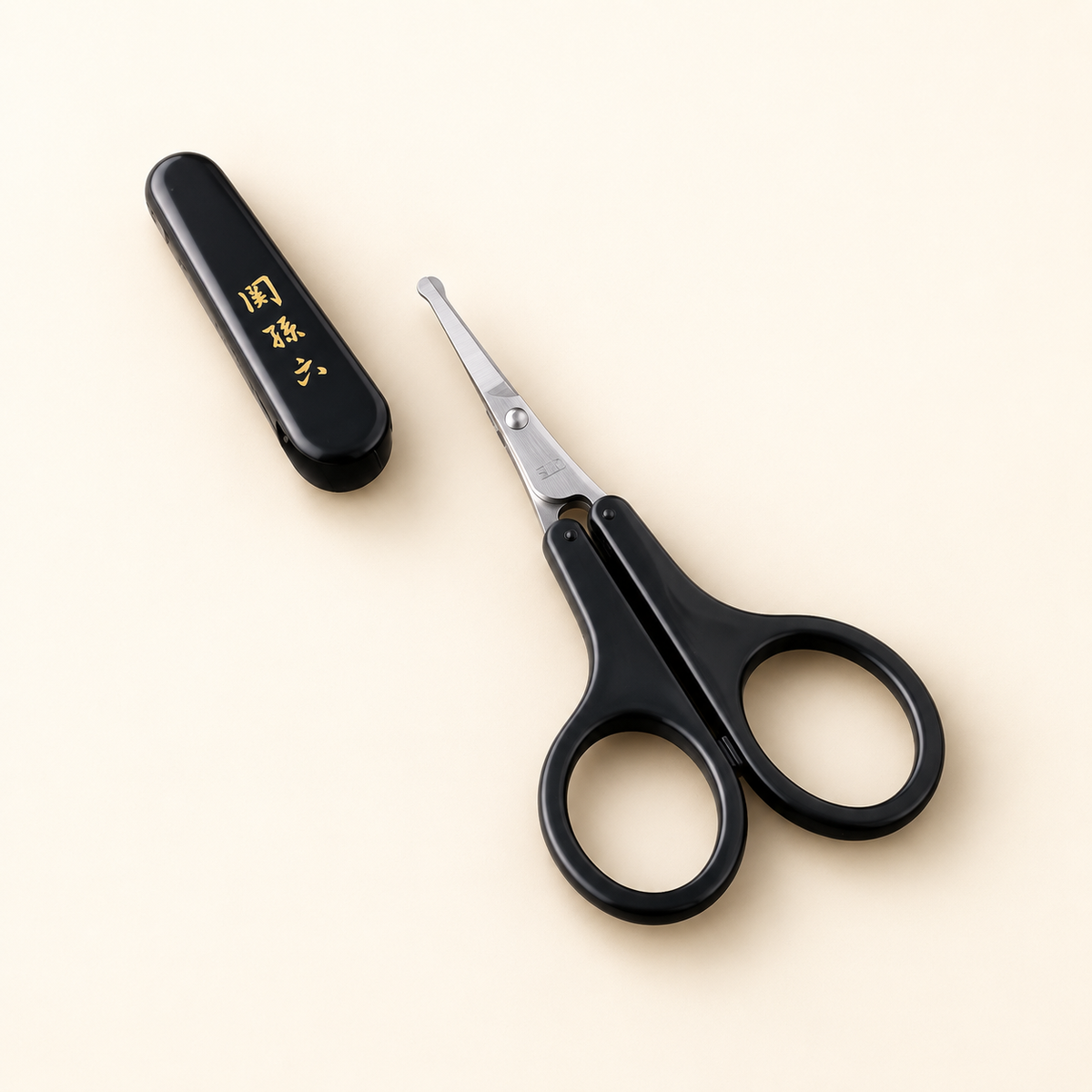 Compact KAI safety scissors with protective storage cap
