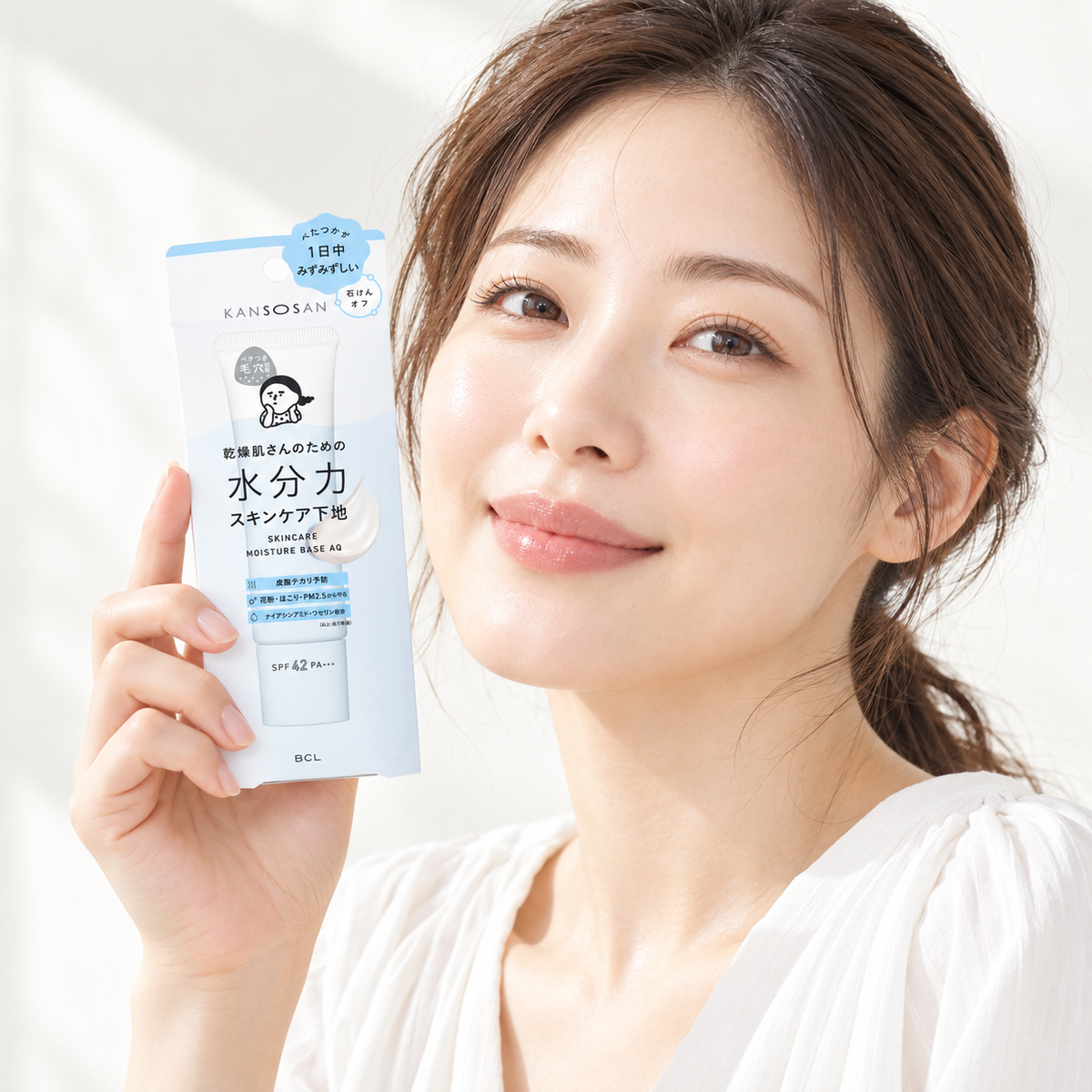 Japanese model holding KANSOSAN Water Moisture Base