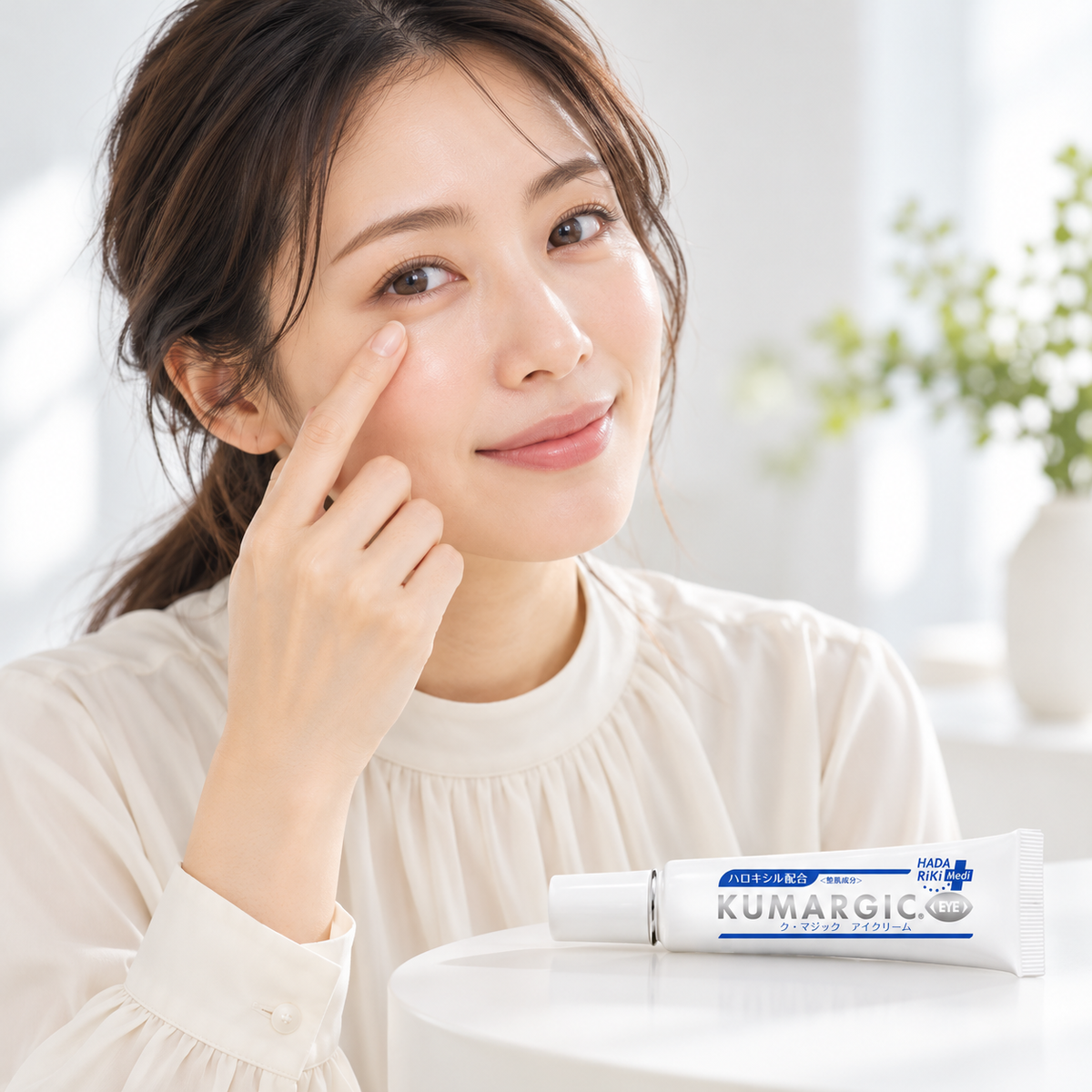 Japanese model applying eye cream