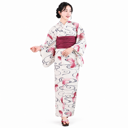 KYOETSU ivory yukata with pink petals and navy swirls, black-haired model