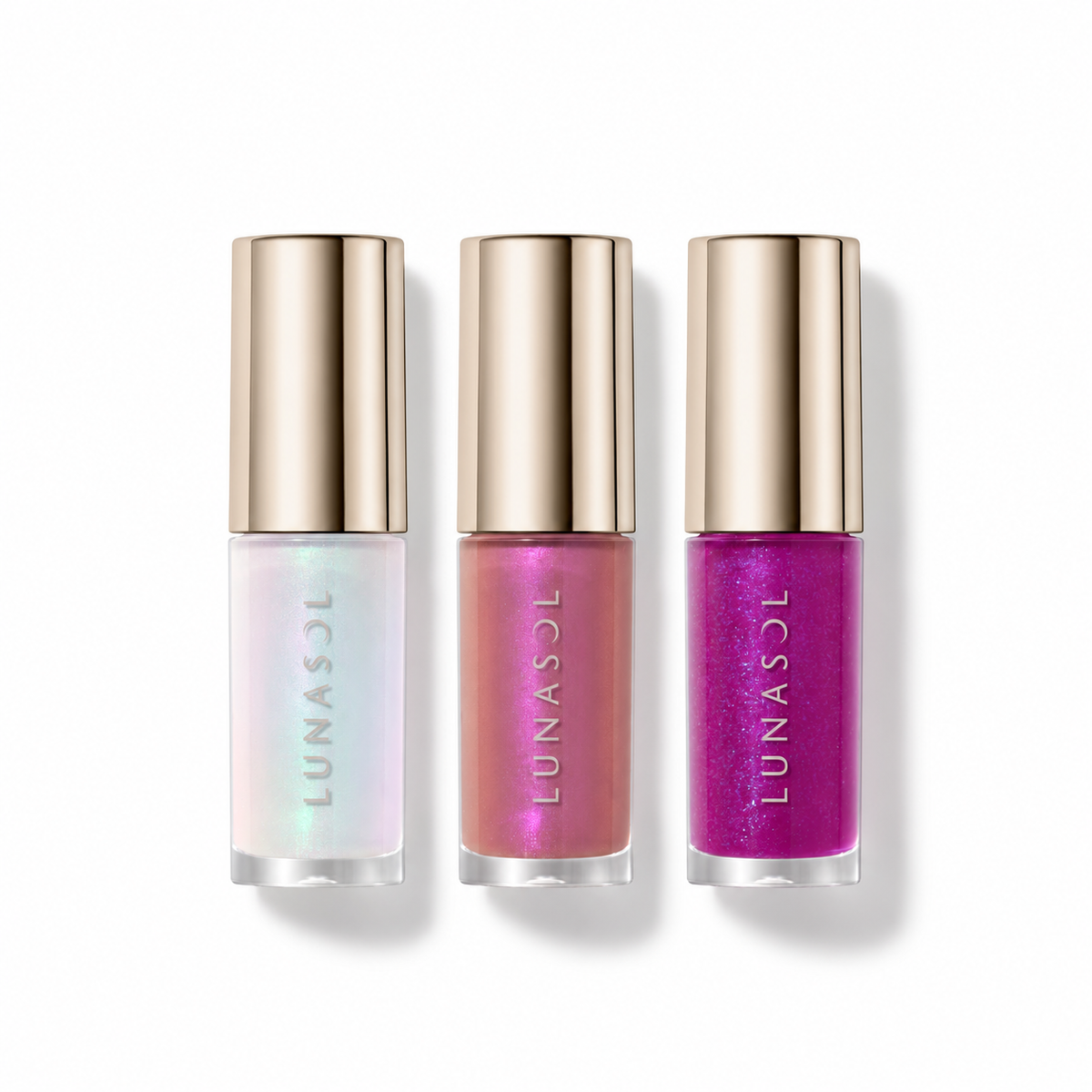 Three LUNASOL Illuminating Lip Oil limited shades on white