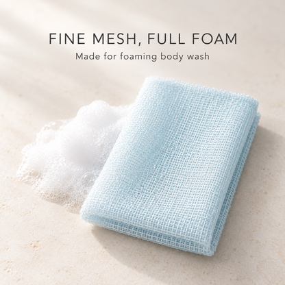Fine mesh and foam detail of the blue MARNA Awawan body towel