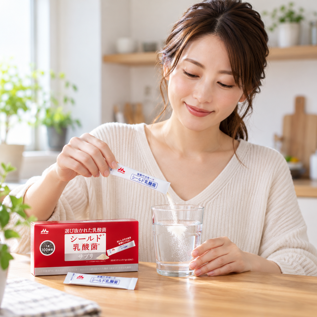 Japanese adult using one Morinaga Shield powder stick in a drink