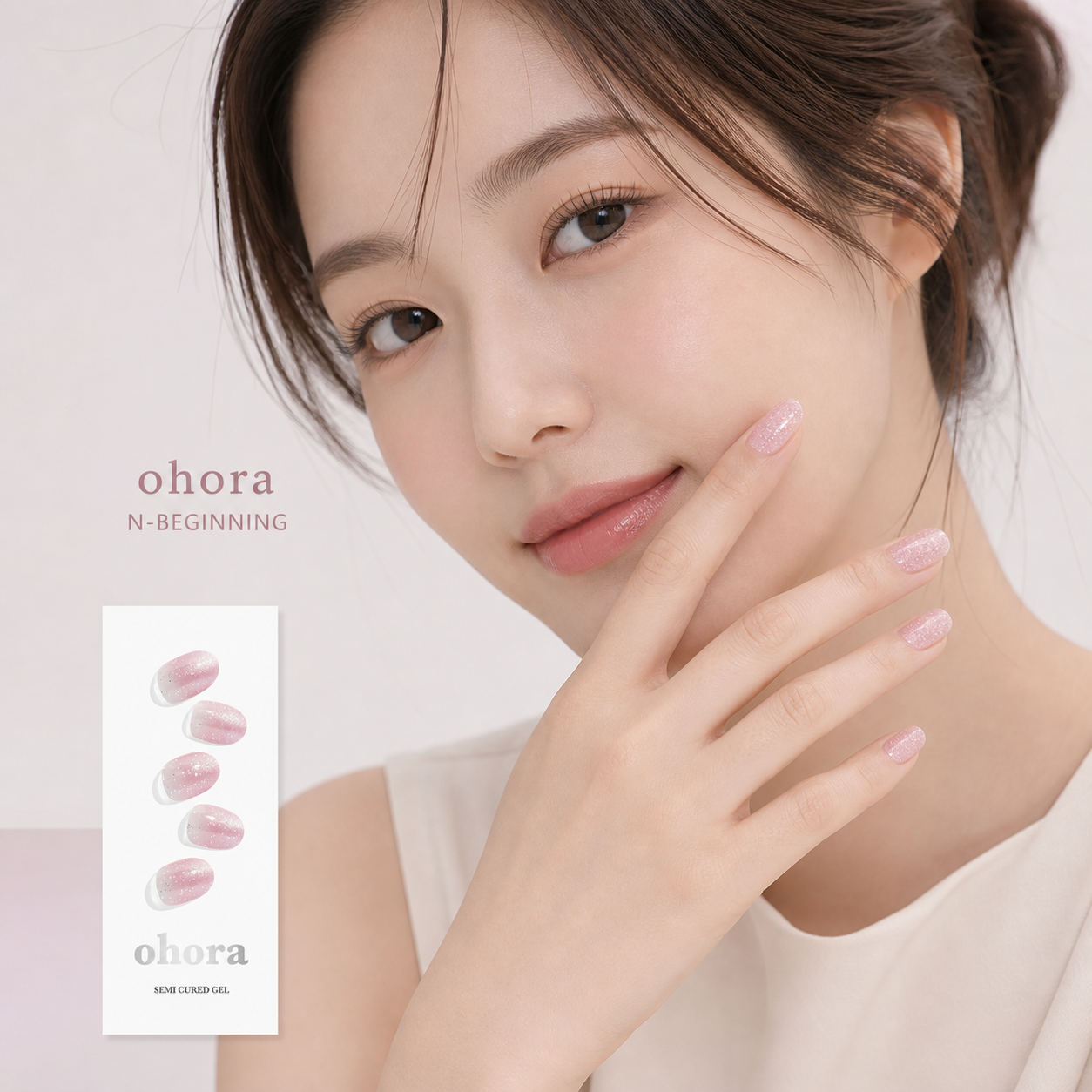 Japanese model wearing ohora N-Beginning pink glitter gel nails