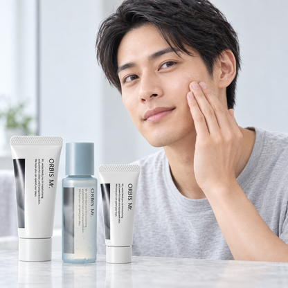 Japanese man applying ORBIS Mr. skincare with the three-piece trial set