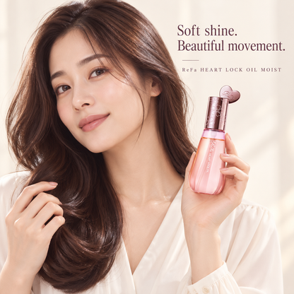 Japanese model holding ReFa HEART LOCK OIL MOIST bottle