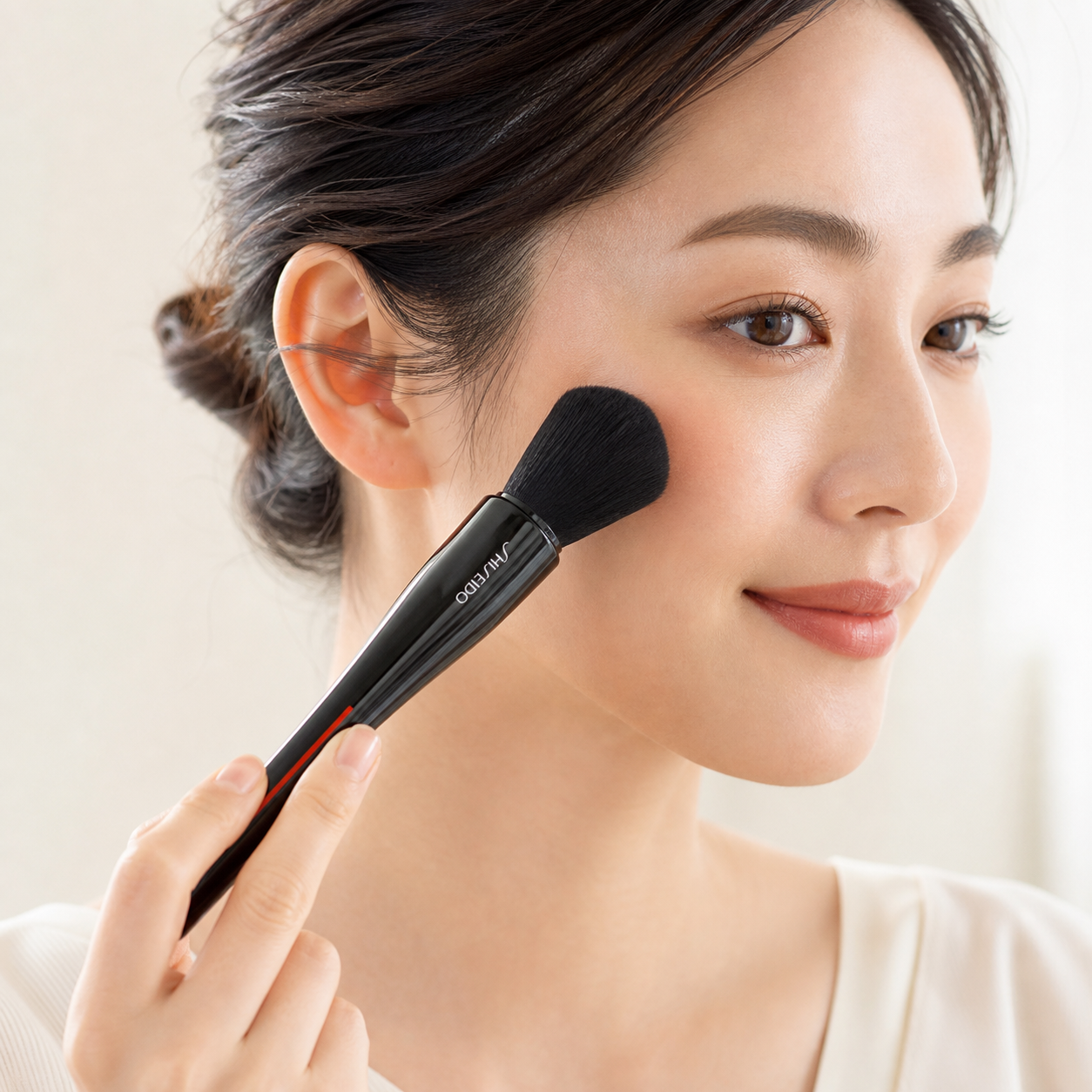 Model using SHISEIDO MARU FUDE Multi Face Brush