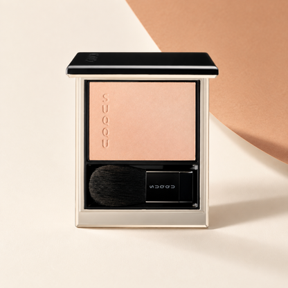 SUQQU Blurring Color Blush 09 YAWAHIBIKI on a minimal warm autumn background