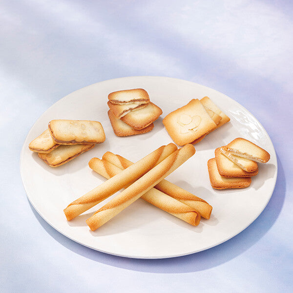 Official photo showing five cookie styles from the assortment