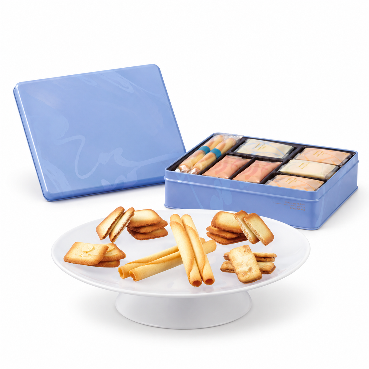 Petit Cinq Délices 27-piece assortment on white background; edited illustrative image