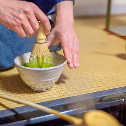 Japanese chasen whisking matcha